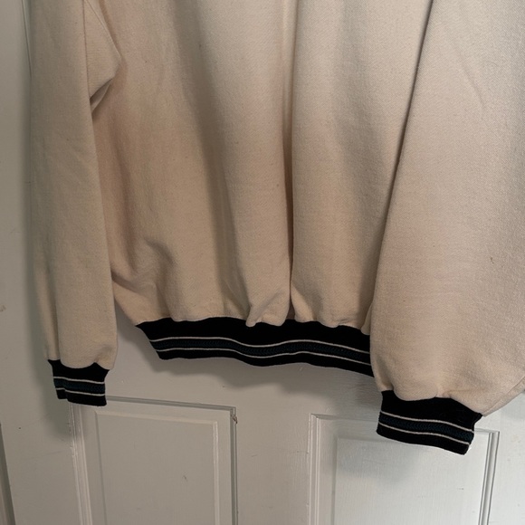 CHANEL Cream V-Neck Sweater with Dark Green & Black Trim and Embroidered Logo - Picture 7 of 7